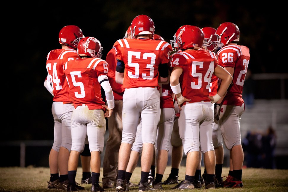 Huddle Harmony: The Importance of Team Communication in American Football